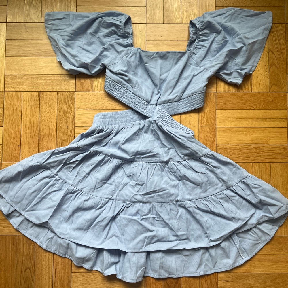 Never worn backless blue mini dress.